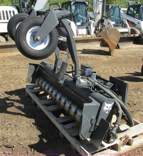 skid steer bucket with soil conditioner|bobcat soil conditioner attachment.